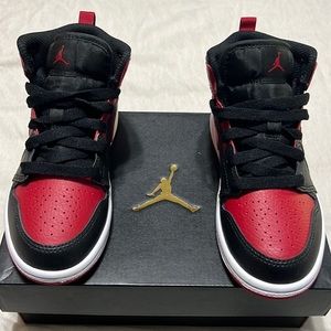 Kids deserve a sneaker as ICONIC as them: Air Jordan Retro 1 Mid Top